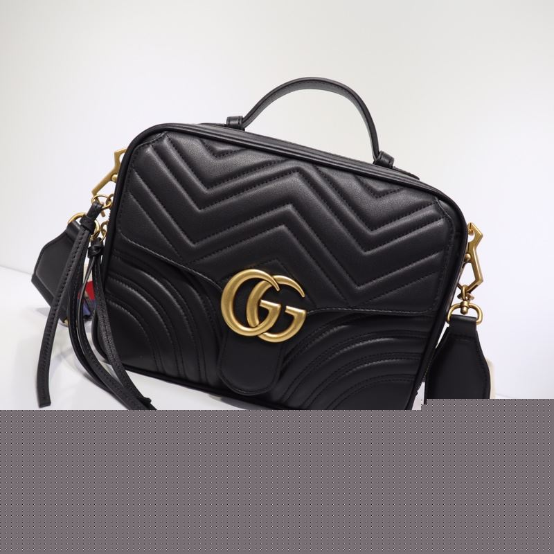 G*u*i top handle bags